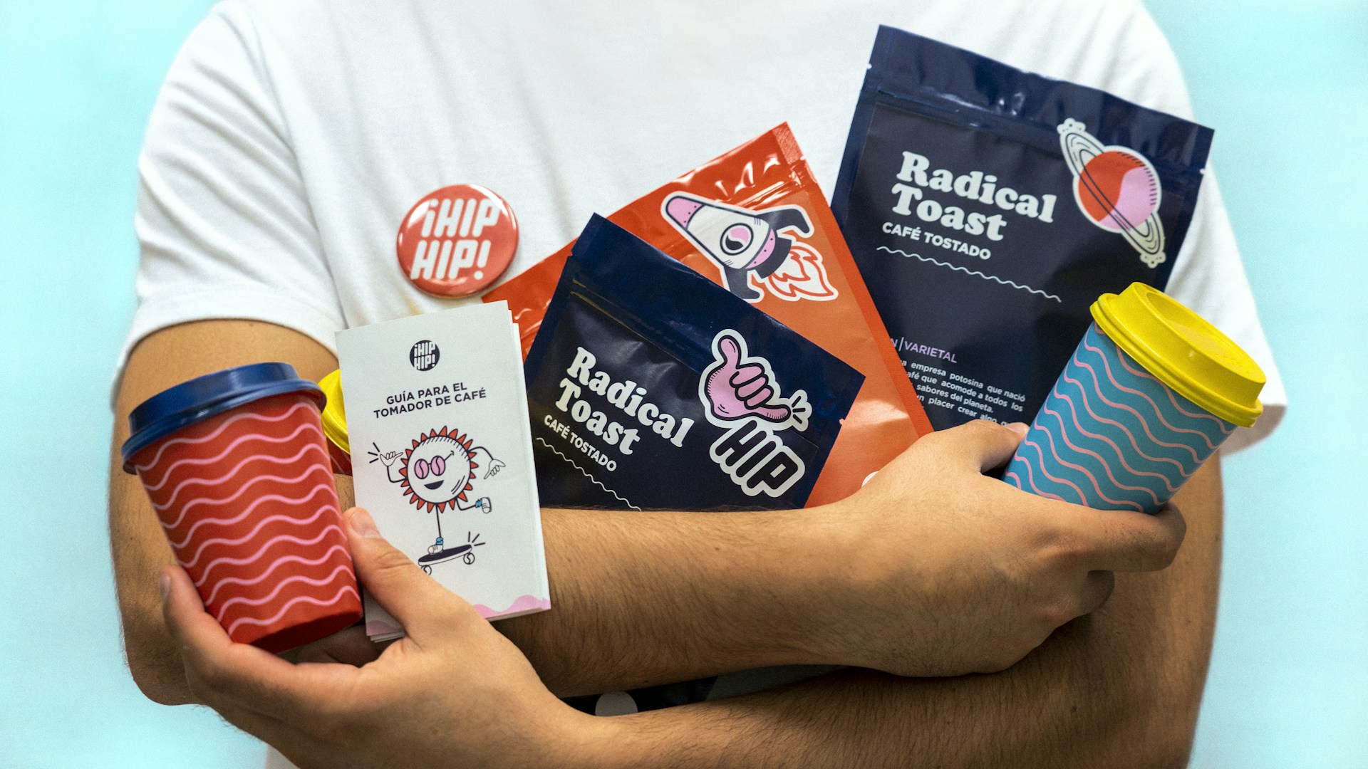 Person holding branding products on their arms